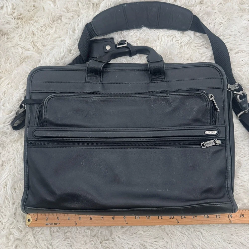 Tumi Black Leather Briefcase with Expandable Pouches Compartments